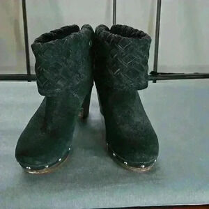 Ugg brand, wooden healed boots. Black suede size 5.